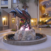 Bronze life size dolphin pod sculpture for a fountain at Dolphin Bay Resort in Shell Beach California.